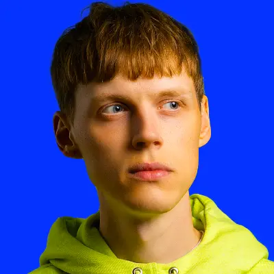 Profile picture showing nanobii wearing a green sweatshirt against a blue background